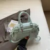 Bolso de mano pequeño de charol plisado estilo funcional de nicho para chica dulce y cool, bolsa cilíndrica con múltiples compartimentos, bolso versátil de un solo hombro o cruzado