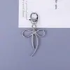 Nuevo Llavero Creativo de Aleación de Zinc Mariposa Hueca Dulce y Fresca Hebilla de Anillo Geométrico Accesorio de Llave Lazo Venta al por Mayor