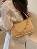 Bolso de hombro tejido minimalista estilo coreano, bolso de moda a la moda con bloques de color para llevar debajo del brazo, bolso de paja único y casual