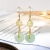 Aretes de hebilla de paz en un nuevo estilo chino, inspirados en la cultura tradicional china, con imitación de jade Hetian de alta calidad, diseñados para mujeres, delicados y adecuados para atuendos Hanfu, aretes vintage de nicho