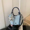 Bolso Exquisito de Gran Capacidad Transfronterizo 2026 Nuevo Bolso de Hombro Bajo el Brazo para Mujer Bolso Cruzado Tipo Cubo para Viajes