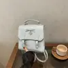 Mochila de Bolinhas Estilo College para Mulheres 2026 Nova Tendência Mochila de Aula para Estudantes Universitários Bolsa de Ombro Cruzada Versátil Casual