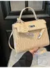 Fábrica de Origen de Exportación Transfronteriza Bolso Kelly para Mujer 2025 Nuevo Bolso de Hombro de Moda Retro Bolso Cruzado Casual Europeo y Americano