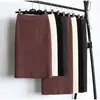 Saia de tricô cintura alta com fenda em estoque transfronteiriça para mulheres, vestido de tricô slim fit outono e inverno, saia de tricô cor sólida