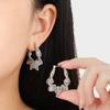 Aretes Transfronterizos de Nuevo Nicho con Temperamento Simple de Línea Torcida de Primavera Moda Personalidad Combinan con Todo Chapados en Oro Acero de Titanio