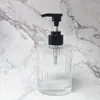 Botella de loción con boca de tornillo rayada 180ml Botella con cabeza de bomba de presión Botella de vidrio Botella de loción vacía transparente