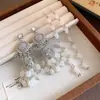 Pendientes de borla de cristal redondo con incrustaciones de diamantes, pendientes de estilo étnico bohemio, pendientes exagerados y únicos de alta gama al por mayor