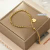 Pulsera Ajustable de Acero de Titanio con Tirador de Corazón Tobillera de Cadena de Perlas Redondas para Mujer Estilo que No se Desvanece Lujo Accesible Pulsera Europea y Americana Elegante