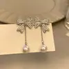 Brincos de laço com pérolas e diamantes, brincos de outono e inverno de alta qualidade para mulheres, brincos únicos e bonitos, brincos pendentes com franjas, acessórios de orelha