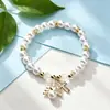 Pulseira de Contas Imitação Rosa Branco Cruzada Quente Vazada Cruz Anjo Acessórios Pulseira Nova de Fio Elástico
