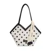 La popular bolsa de asas grande de estilo coreano con lunares de este año para ir al trabajo, nuevo bolso de hombro de moda 2026 para mujer