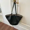 Bolso de mano tejido con textura simple y atmosférica estilo coreano para mujer 2026 Nuevo Pequeño de Nicho de Gama Alta para Viajes Diarios Bolso de Hombro Único