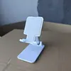 Soporte para teléfono móvil al por mayor, de escritorio multifuncional portátil plegable ajustable actividad regalo juguete venta al por mayor transfronteriza