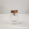 Al por mayor en stock 30ml 50ml 100ml Botella con atomizador de presión de bayoneta Botella dispensadora portátil Material blanco fino