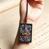Colgante sin preocupaciones de madera de agarwood Dios de la Riqueza Pintado a mano Exquisitamente tallado Relieve 3D Colgante para colgar Imitación de madera de agarwood Juguete cultural Artículos de madera