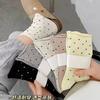 Calcetines de mujer hasta media pantorrilla con diseño de lunares rizados, modernos calcetines japoneses de pila JK, bonitos calcetines retro a juego para estudiantes.