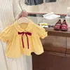 Conjunto de Verano para Niña 2026 Nuevo Estilo Moda Bebé Camisa de Muñeca y Pantalones Cortos de Mezclilla Elegantes Conjunto de Dos Piezas de Verano Moderno