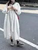 Camisa vestido branco feminino outono, temperamento francês, solta, emagrecedora, simples, generosa, super bonita
