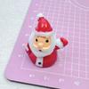 Serie navideña accesorios de resina de dibujos animados tridimensionales Papá Noel diy cadena para teléfono móvil llavero colgante material al por mayor