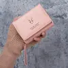 Cartera Pequeña de Mujer Transfronteriza Cuero Nuevo Monedero de Mano Cremallera Dos en Uno 70% de descuento Portatarjetas Bolsa de Almacenamiento Integrada