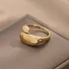 Anillo ovalado liso de temperamento de moda transfronterizo diseño para mujer sentido de diseño nicho latón chapado en 18K abierto ajustable anillo para el dedo
