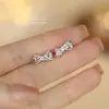Pendientes originales de plata s925 con circonita incrustada, diseño de lazo hueco para mujer, juego de joyería versátil de lujo ligero para el Festival Qixi, collar elegante