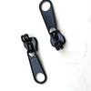 Fabricantes de Zhejiang 5# cabeza de cremallera de ojo de cerradura de nylon Estuche de equipaje Cremallera Candado de Metal cabeza de cremallera especial