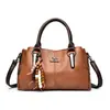 Bolsa Nueva Transfronteriza Europea y Americana Simple 2026 Bolso de Mano de Gran Capacidad para Mujer Bolso de Hombro Versátil de Moda Retro para Viajar al Trabajo para Mujer