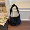 Bolsa transversal minimalista retrô com laço transfronteiriça para mulheres, nova bolsa versátil de tecido para o dia a dia estilo bolinho 2026