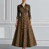 Outono/Inverno 2026 Novo Vestido Longo Europeu e Americano de Moda Transfronteiriça com Estampa de Leopardo, Gola Reversível e Mangas Longas, Vestido Longo Feminino