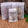 Bolsitas de té de tela no tejida con cordón, disponibles en varios tamaños, para uso doméstico como bolsas filtrantes para hojas de té, separador de residuos de decocciones herbales y bolsas desechables para marinar