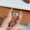 Anel de Impressão Branco Wengfaros Bidimensional, Fashion e Versátil, com um Design Inspirado no Anel de Impressão Branco