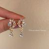 Pendientes de mariposa con perlas de Dongdaemun de Corea del Sur, ligeros, de lujo, de alta gama, con forma de gota de aceite y flores, de plata 925.