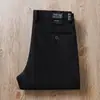 Estación europea otoño e invierno algodón modal sarga microelástico simple negocios lavado cintura media ajuste recto pantalones casuales para hombre