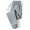 Calças Casuais Masculinas Primavera Outono Inverno Calças Esportivas Engrossadas Calças Skinny Largas Tamanho Plus Calças Longas de Cor Sólida