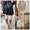 Falda corta ajustable para maternidad, colección otoño 2026, media falda plisada, que cubre el vientre, de punto, estilo primavera y otoño, falda versátil de línea A para usar con prendas exteriores