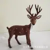Animal de simulación ciervo sika simulación alce jirafa modelo animal de piel accesorios de decoración para cine y televisión venta al por mayor