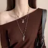 2025 Nuevo Collar Colgante de Otoño e Invierno Nueva Cadena de Suéter Larga con Borlas Chinoiserie Accesorios de Moda de Nicho Únicos para Mujeres