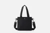 Bolso bandolera simple nuevo para mujer, ligero, moderno, bolso de hombro versátil para ir al trabajo y uso casual, bolso bandolera pequeño de tela de nailon