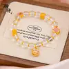 Esperando con ansias el Pulsera de Cristal Transparente Natural Simple y Fresca para Mujer con Oro Arena Burbuja Marta Bubu para Atraer Riqueza y Fortuna