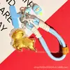 Colgante de cadena para teléfono de oveja que hace parpadear dinero de dibujos animados de oro puro 999, llavero de oveja que trae fortuna, personalizable y disponible para venta al por mayor