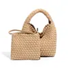 Bolsa de mimbre para cesta de comida versátil de alta gama de moda nueva de principios de primavera, bolso hecho a mano, bolso tipo cubo para llevar al hombro