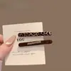 Pinza para el pelo única y hermosa con flecos para mujer, nuevo modelo 2026, pinza frontal de alta gama para flequillo, accesorio para el pelo de pinza lateral con estampado de leopardo