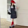 Conjunto de Primavera y Verano para Niñas 2026 Nueva Moda Estilo Coreano Casual Top Rayado y Falda de Tirantes para Niños Mayores Moderno