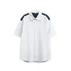 Yidao Vintage 2026 Verano Nuevo Estilo Hong Kong Patchwork Rayas Manga Corta Hombre Moderno Holgado Versátil Camisa