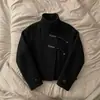 Nuevo abrigo corto de lana ajustado para otoño, de estilo transfronterizo, con botones diagonales, cuello alto, negro, holgado y único.