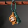 Rosto de boneca criativo e peculiar, famoso na internet, desenho animado estilo healing, bolsa charmosa com borla, chaveiro e item decorativo feitos de buxo com design de arco-íris