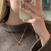 Europa y Estados Unidos transfronterizo Amazon nuevo temperamento retro gota aceite amor collar pendientes traje moda Joker simple