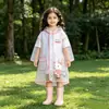 Impermeable infantil para estudiantes de primaria, poncho de lluvia impermeable para niños y niñas con espacio para mochila