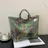 Bolsa Tote Retrô de Grande Capacidade para Mulheres 2026 Nova Bolsa de Ombro Transparente Estampada com Textura Estilosa para o Dia a Dia e para Carregar na Mão